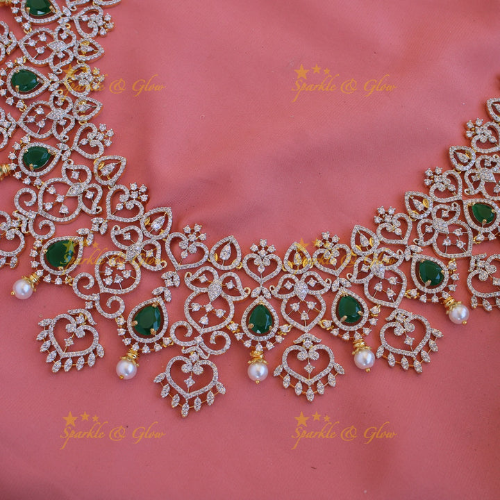 Grand intricate floral leaflet design American diamond long necklace with emerald and pearls - green