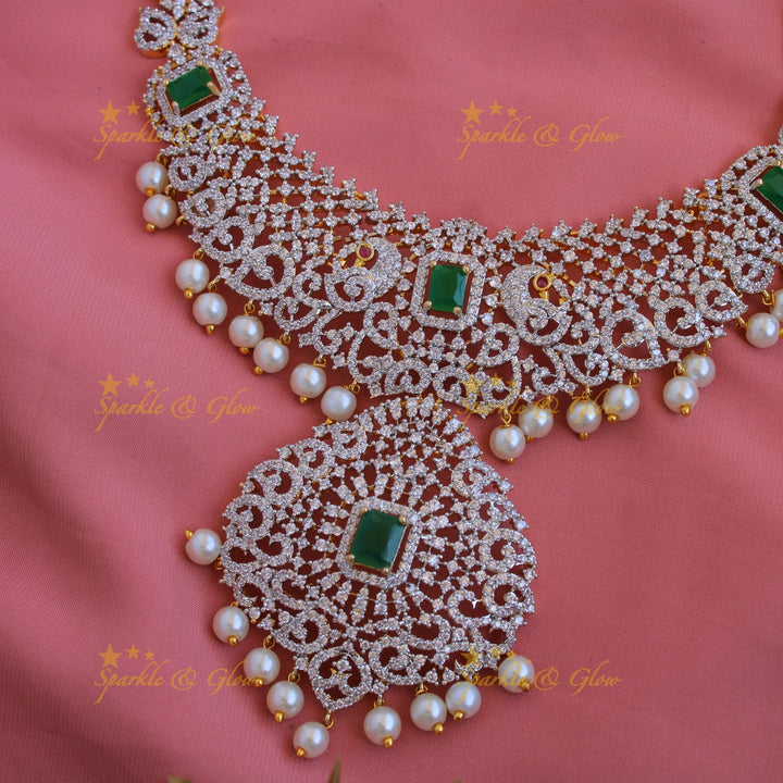 Satement Peacock floral design American diamond long necklace with emerald and pearl drops