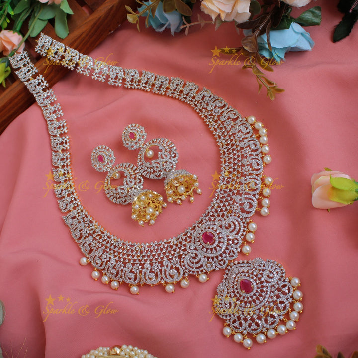 Exclusive Peacock floral design American diamond long necklace with ruby and pearl drops - pink