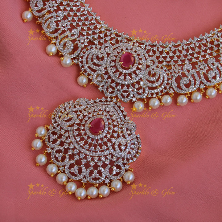 Exclusive Peacock floral design American diamond long necklace with ruby and pearl drops - pink
