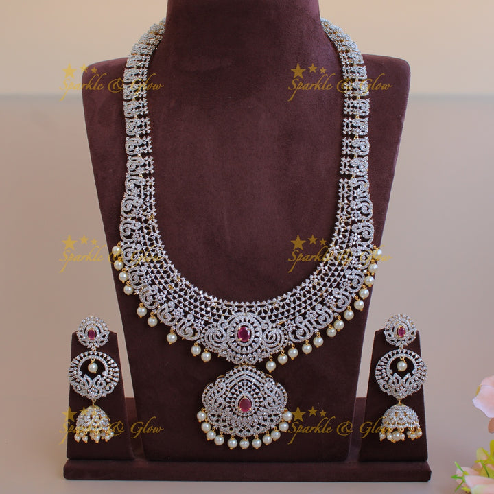 Exclusive Peacock floral design American diamond long necklace with ruby and pearl drops - pink