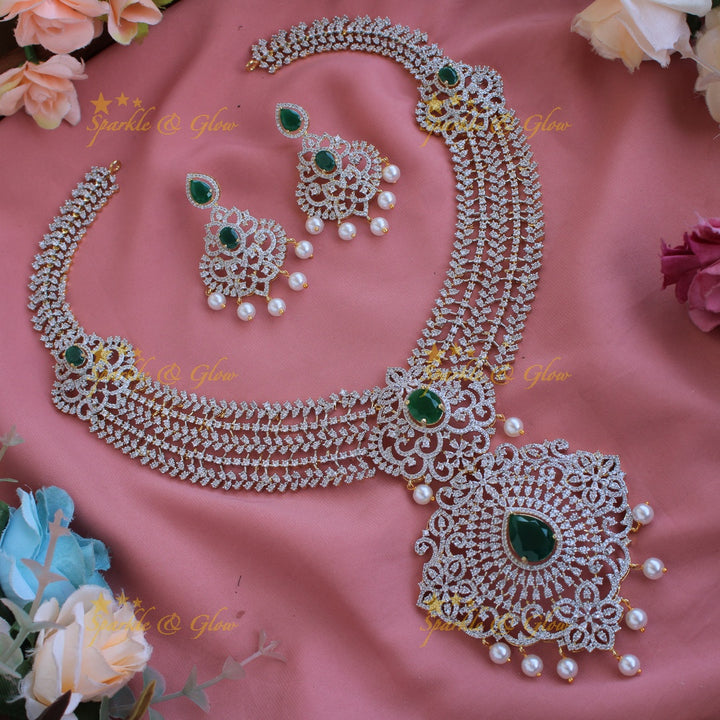 Sparkling Floral leaflet design American diamond long necklace with ruby and pearl drops - pink