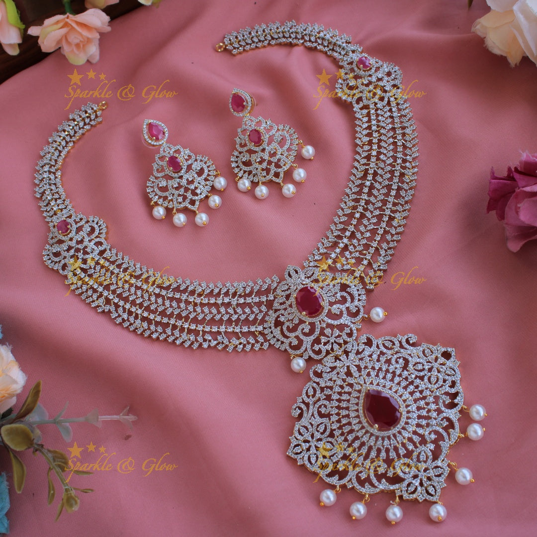 Sparkling Floral leaflet design American diamond long necklace with ruby and pearl drops - pink