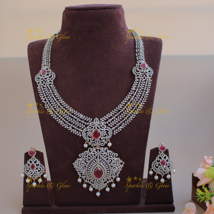 Sparkling Floral leaflet design American diamond long necklace with ruby and pearl drops - pink