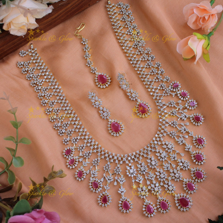 Gorgeous Floral drop design American diamond long necklace with maang tikka with ruby - pink