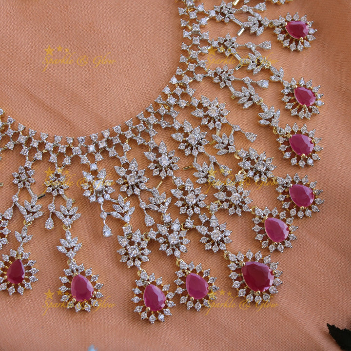 Gorgeous Floral drop design American diamond long necklace with maang tikka with ruby - pink