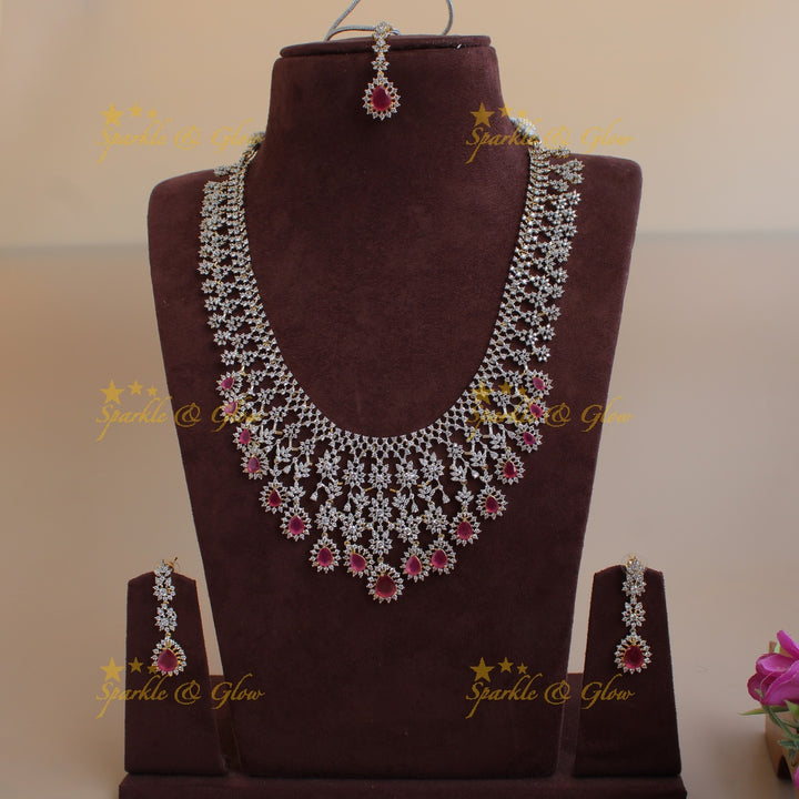 Gorgeous Floral drop design American diamond long necklace with maang tikka with ruby - pink
