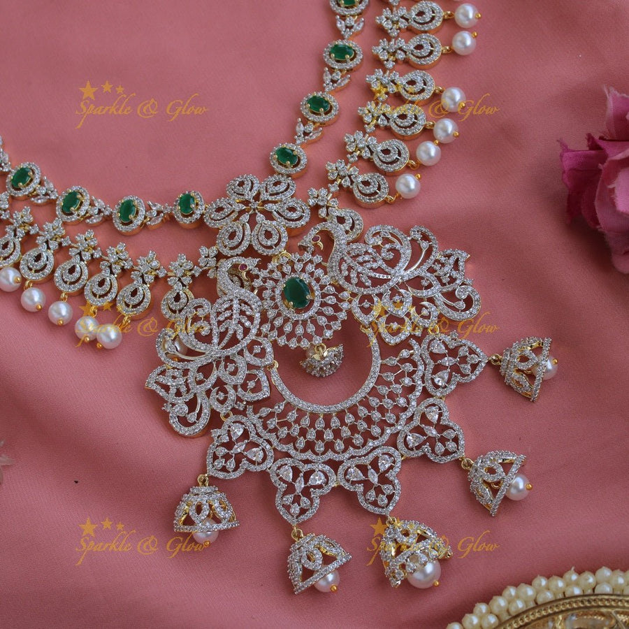 Gorgeous Peacock floral design American diamond layer haram with pealrs emerald and jumuka drops - Sparkle and Glow - Back Thread - 