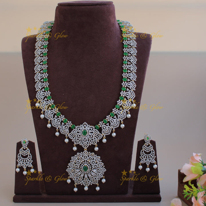 Grand exclusive flower design American diamond long necklace with emerald and pearl drops - green