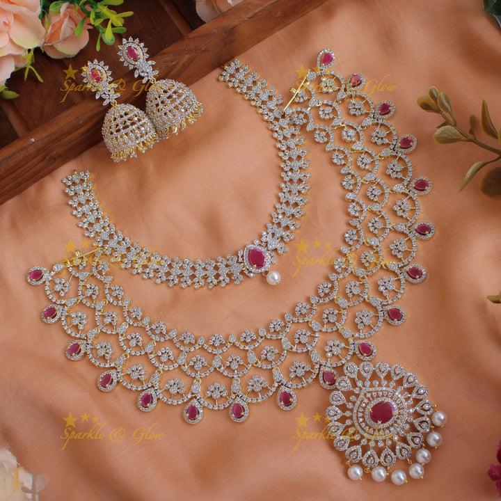 Grand Floral leaflet design American diamond choker and short necklace set with emerald and pearl drops - green