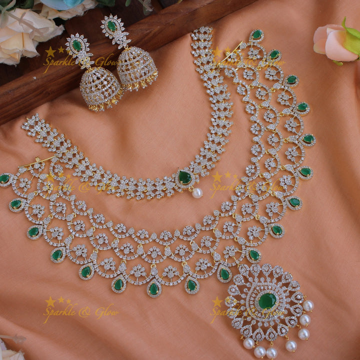 Grand Floral leaflet design American diamond choker and short necklace set with emerald and pearl drops - green