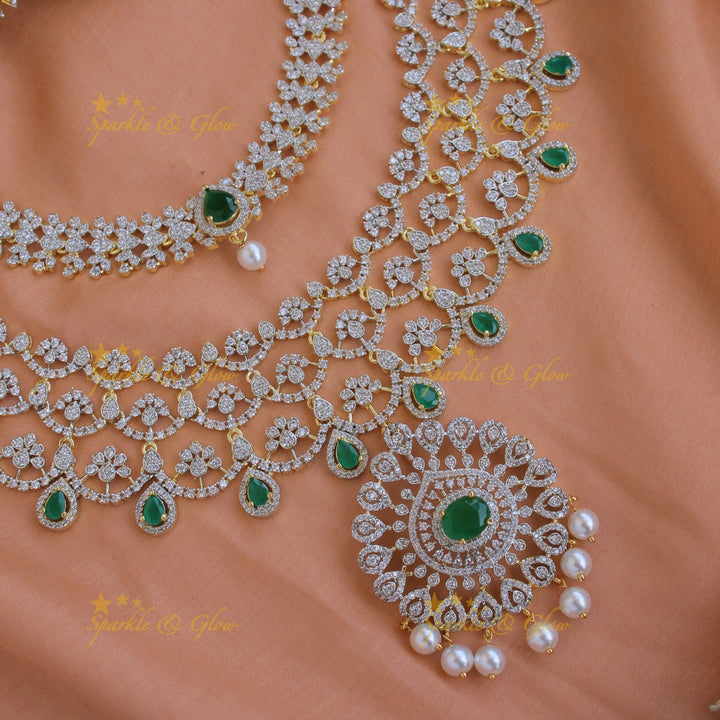 Grand Floral leaflet design American diamond choker and short necklace set with emerald and pearl drops - green