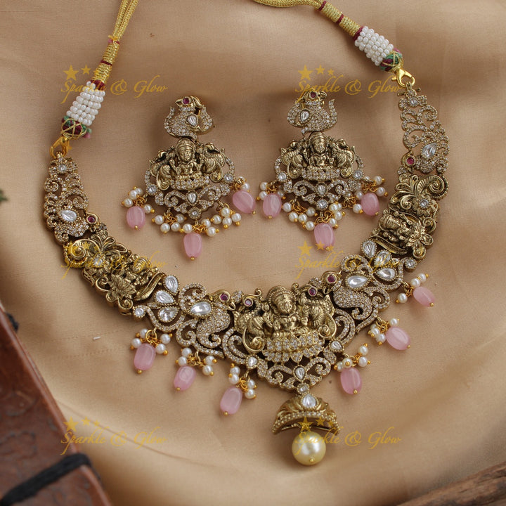 Elegant Lakshmi peacock carved victorian AD short necklace with pearls and purple beads