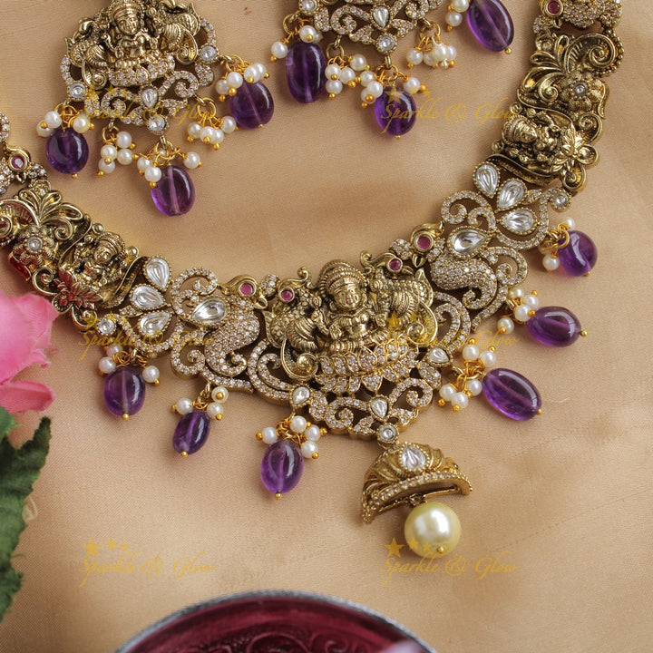Elegant Lakshmi peacock carved victorian AD short necklace with pearls and purple beads