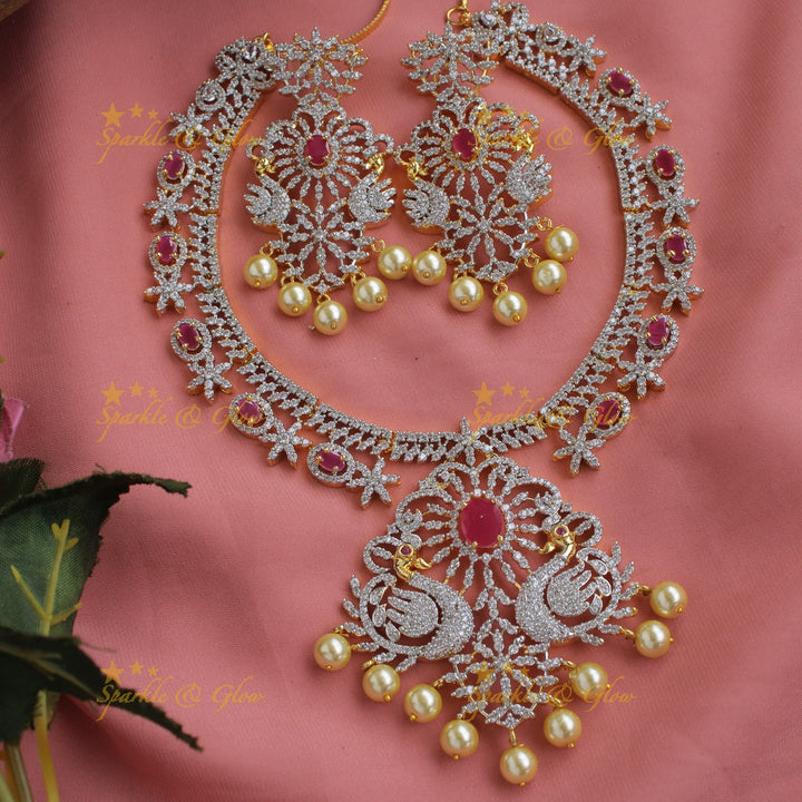 Stunning American diamond Peacock floral design short necklace with pearls and ruby - pink
