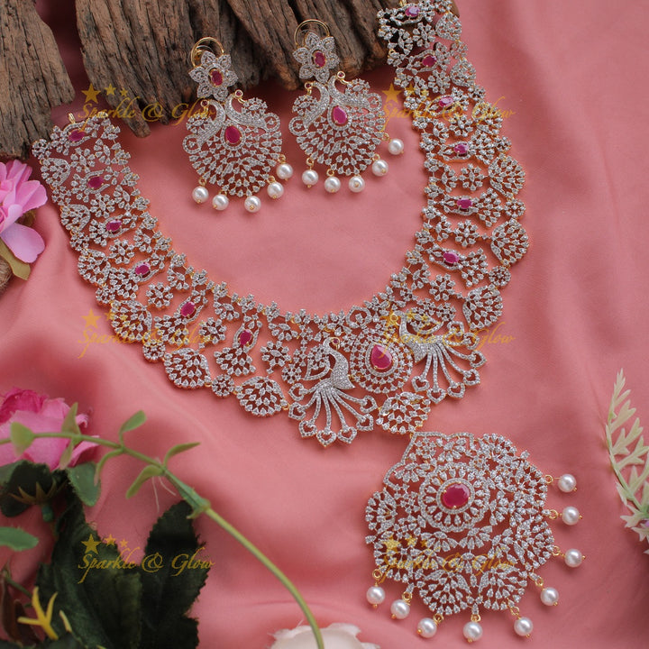 Grand peacock and floral design American diamond long necklace with pearls and emerald - green