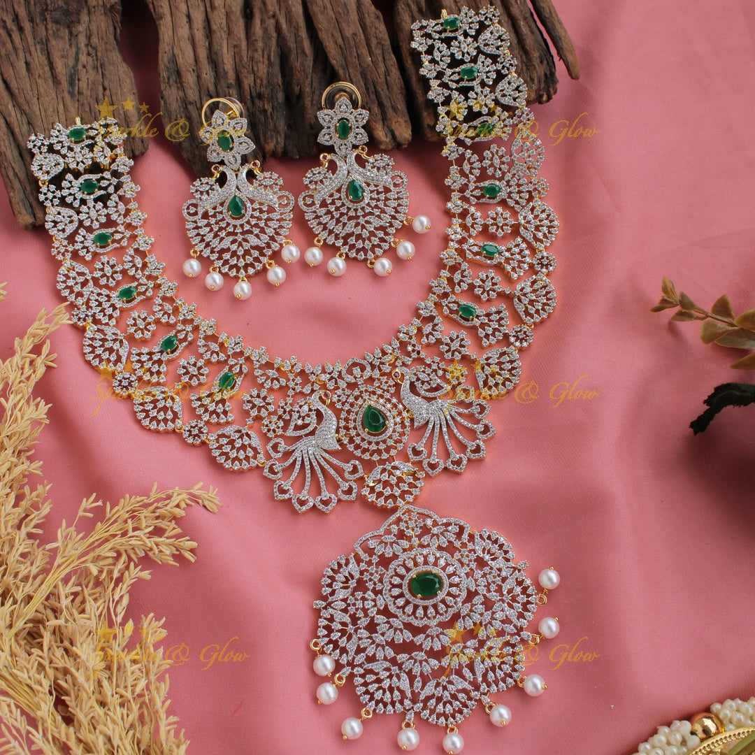 Grand peacock and floral design American diamond long necklace with pearls and emerald - green