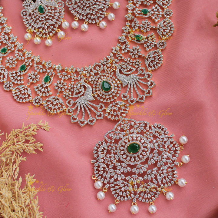 Grand peacock and floral design American diamond long necklace with pearls and emerald - green