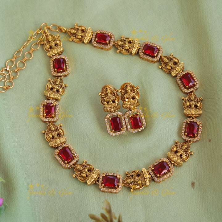 Statement Lakshmi carved  AD short necklace with red stones