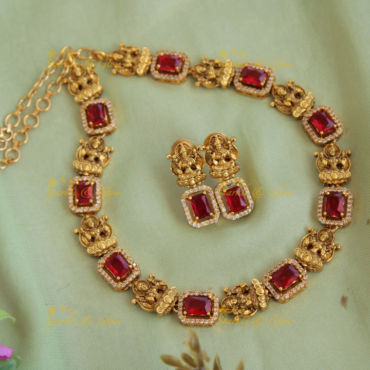 Statement Lakshmi carved  AD short necklace with red stones