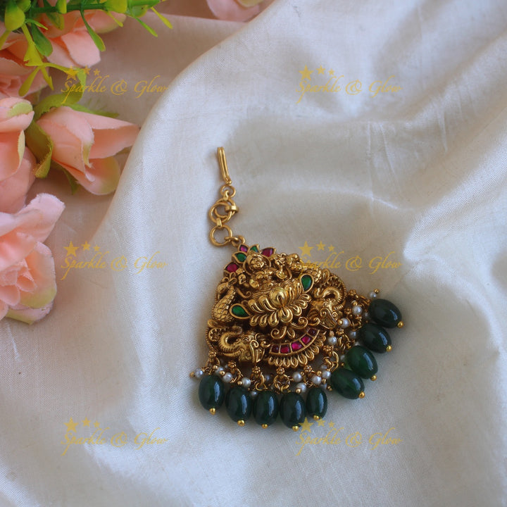 Exclusive lakshmi elephant peacock carved jadau maang tikka with mintgreen beads