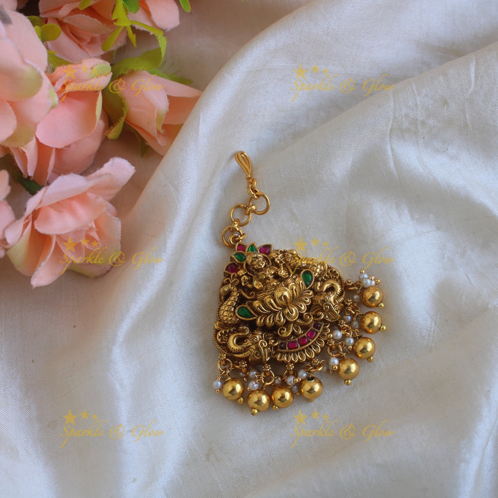 Exclusive lakshmi elephant peacock carved jadau maang tikka with mintgreen beads