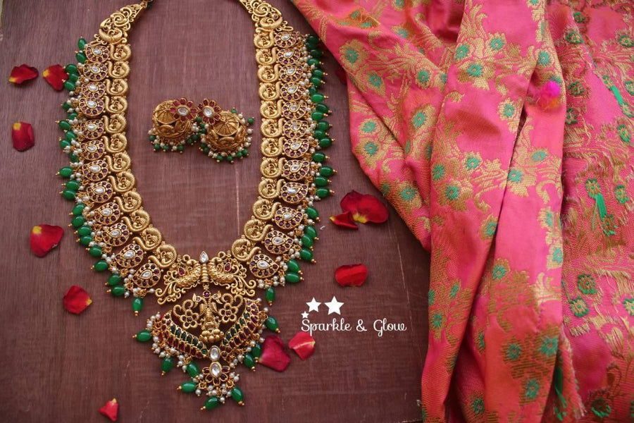 Gold alike polished peacock style grand nagas haram with green and gutta pusalu - Sparkle and Glow