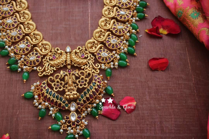 Gold alike polished peacock style grand nagas haram with green and gutta pusalu - Sparkle and Glow