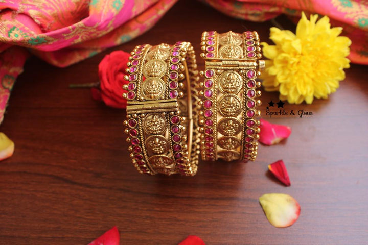 Gold alike antique polished coin bangles with kemp stones a pair