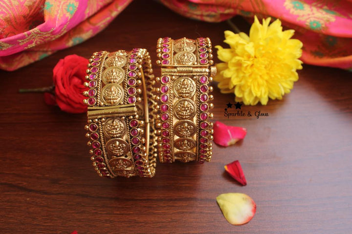 Gold alike antique polished coin bangles with kemp stones a pair