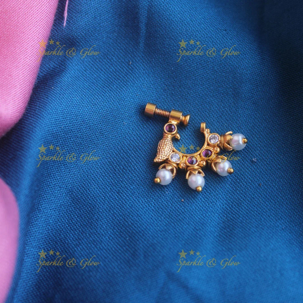 Gold ad Screw type peacock nosepin with Pearls - Sparkle and Glow