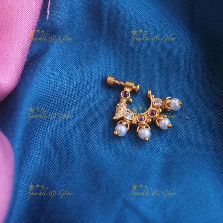 Gold ad Screw type peacock nosepin with Pearls - Sparkle and Glow