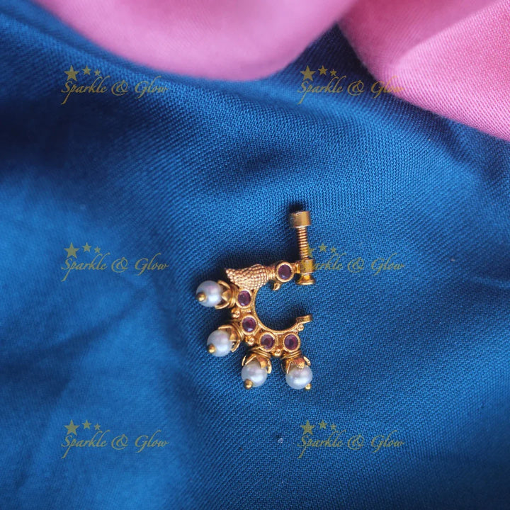 Gold ad Screw type peacock nosepin with Pearls - Sparkle and Glow