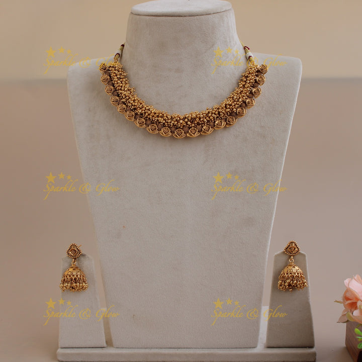 Beautiful intricate leaf design short necklace with gold beads cluster