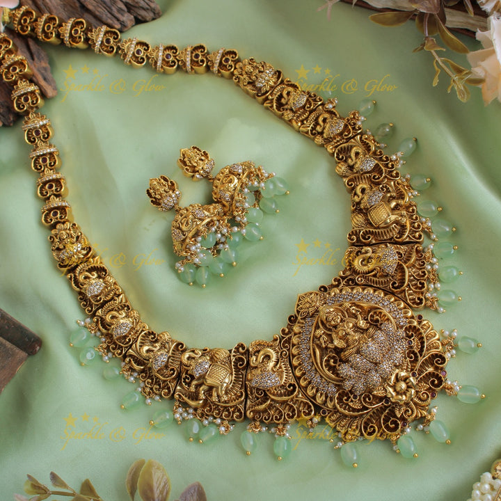 Gorgeous Lakshmi elephant carved long necklace with CZ stones and mint green beads