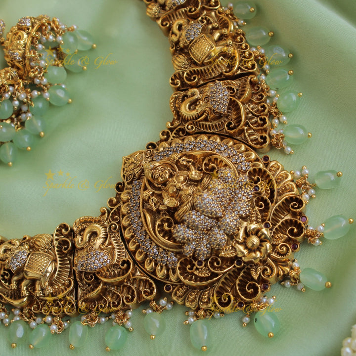 Gorgeous Lakshmi elephant carved long necklace with CZ stones and mint green beads