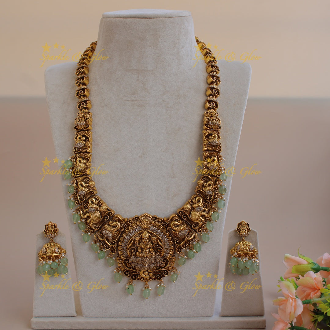 Gorgeous Lakshmi elephant carved long necklace with CZ stones and mint green beads