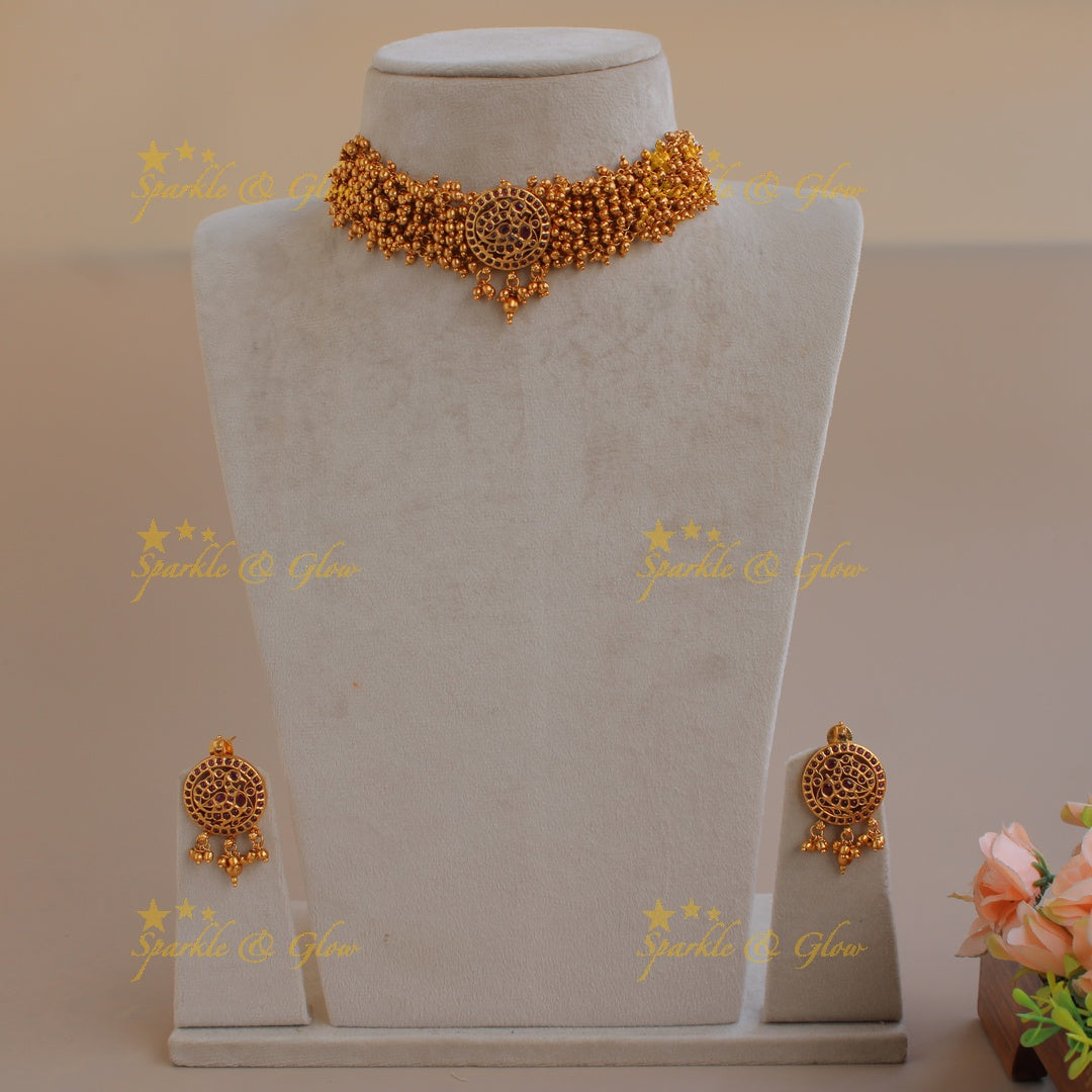 Elegant peacock choker with gold beads cluster