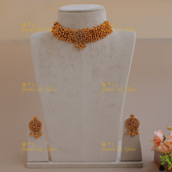Elegant peacock choker with gold beads cluster