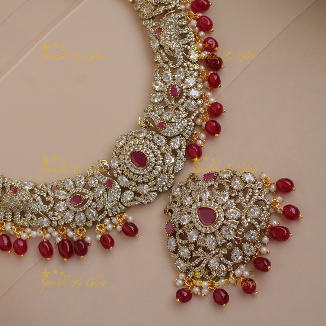Grand intricate Floral Peacock Elephant design Victorian AD long necklace with ruby pearls and red beads