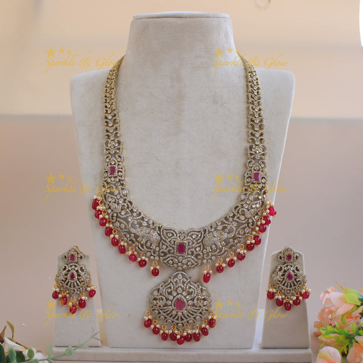 Exclusive grand Floral Elephant Peacock design Victorian AD long necklace with ruby pearls and red beads