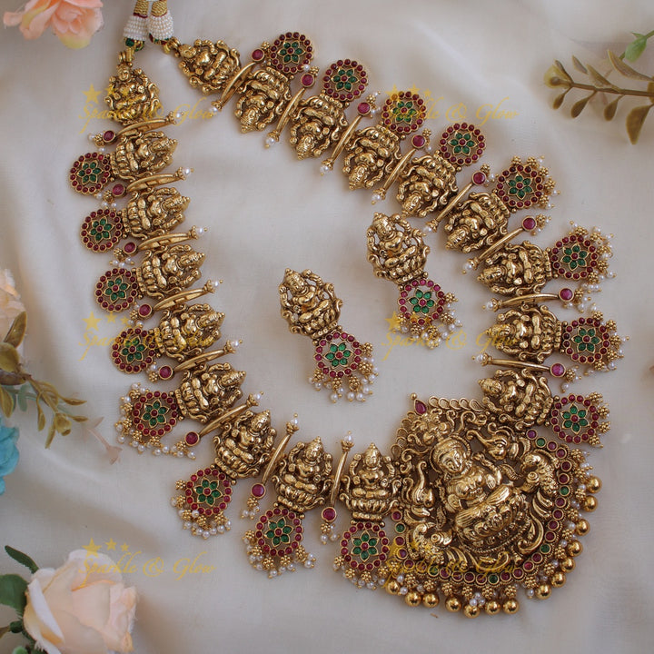 Grand intricate Lakshmi bottu long necklace with ruby emerald and gold beads