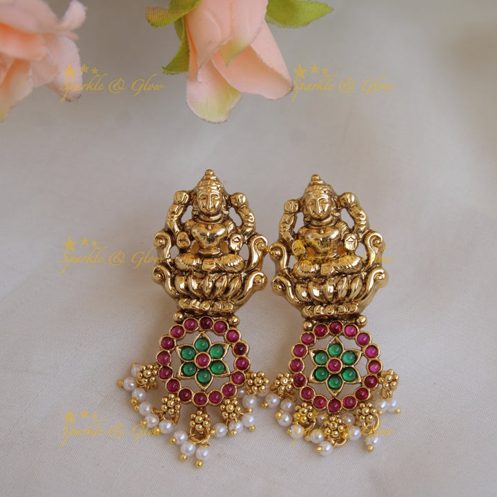 Grand intricate Lakshmi bottu long necklace with ruby emerald and gold beads