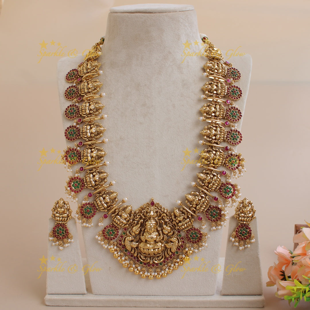Grand intricate Lakshmi bottu long necklace with ruby emerald and gold beads