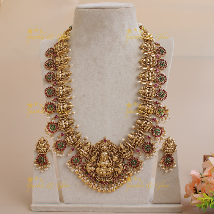 Grand intricate Lakshmi bottu long necklace with ruby emerald and gold beads