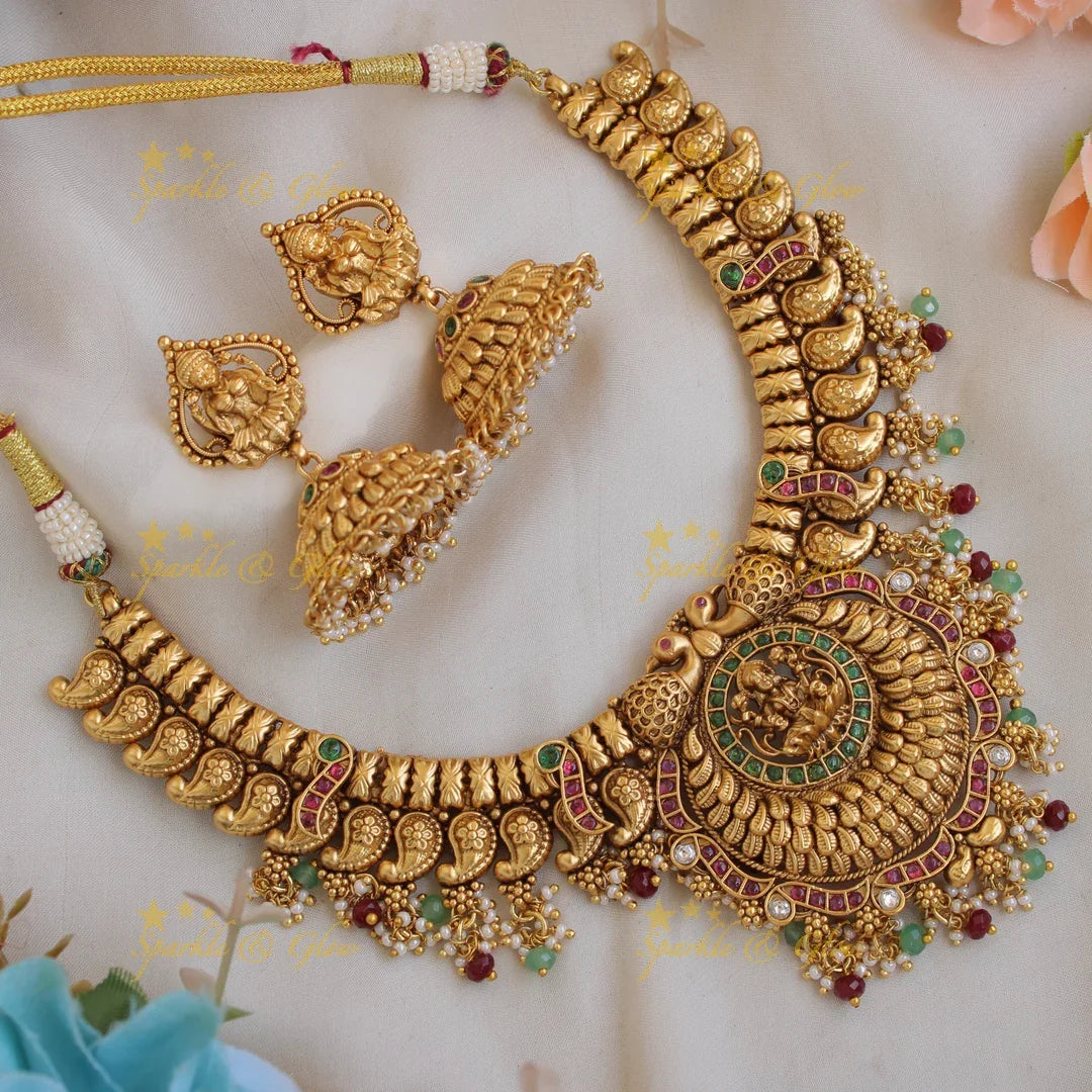 Statement Premium matt Lakshmi peacock mango short necklace with pearls and gold beads - Sparkle and Glow
