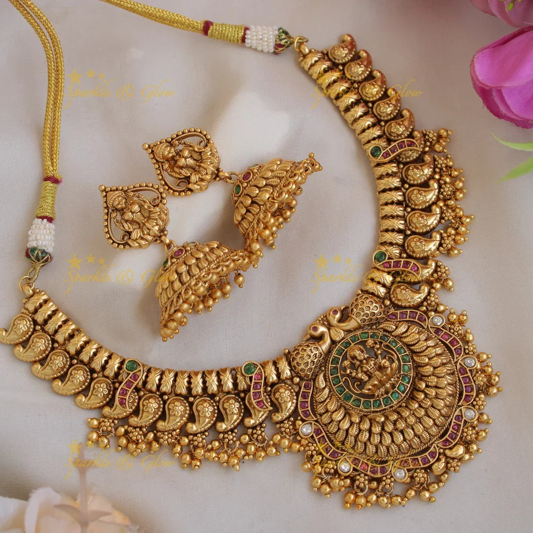 Statement Premium matt Lakshmi peacock mango short necklace with pearls and gold beads - Sparkle and Glow