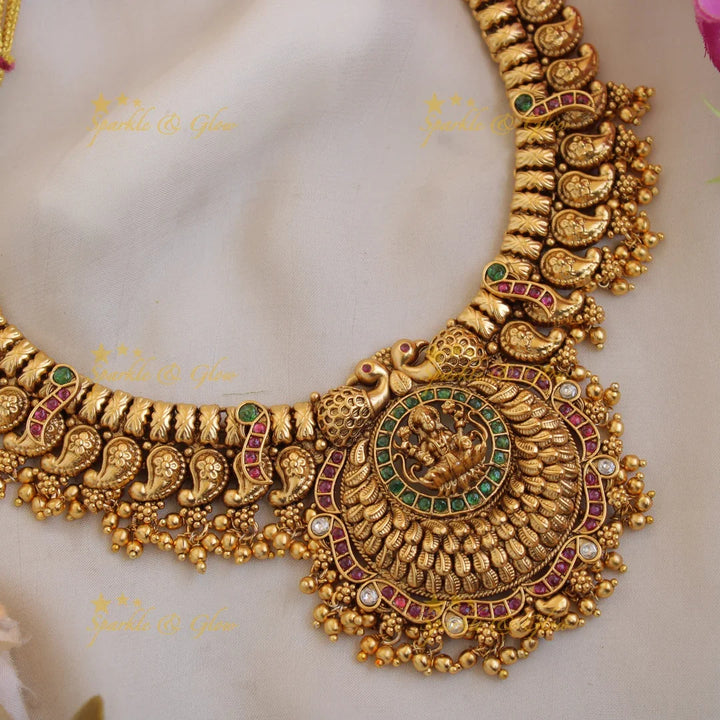 Statement Premium matt Lakshmi peacock mango short necklace with pearls and gold beads - Sparkle and Glow