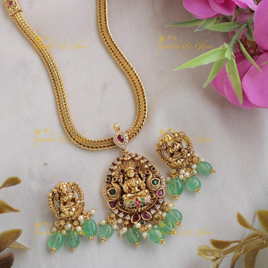 Statement Lakshmi peacock pendent with chain with CZ stones ruby and gold beads - Sparkle and Glow