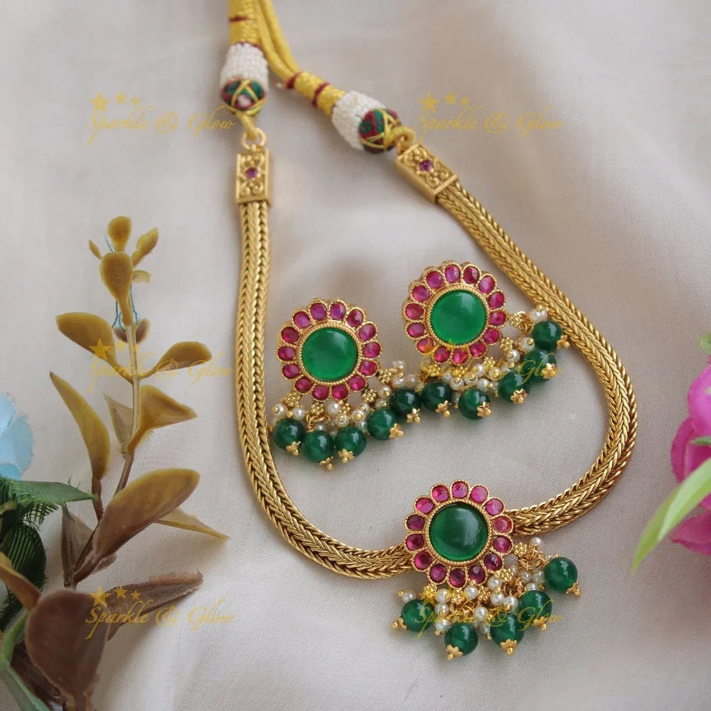 Elegant Floral Kemp stone pendent with chain with pearls and green beads - Sparkle and Glow